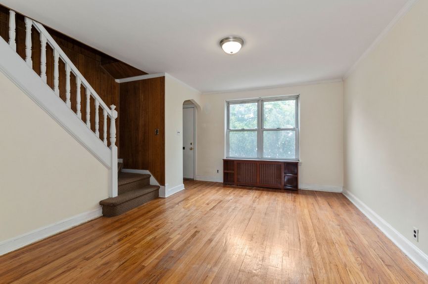 Living room at 20-29 28th St, a single-family home in Astoria, Queens (11105).