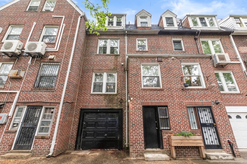 Back Exterior at 34-32 84th St, a single-family house in Jackson Heights, Queens (11372).