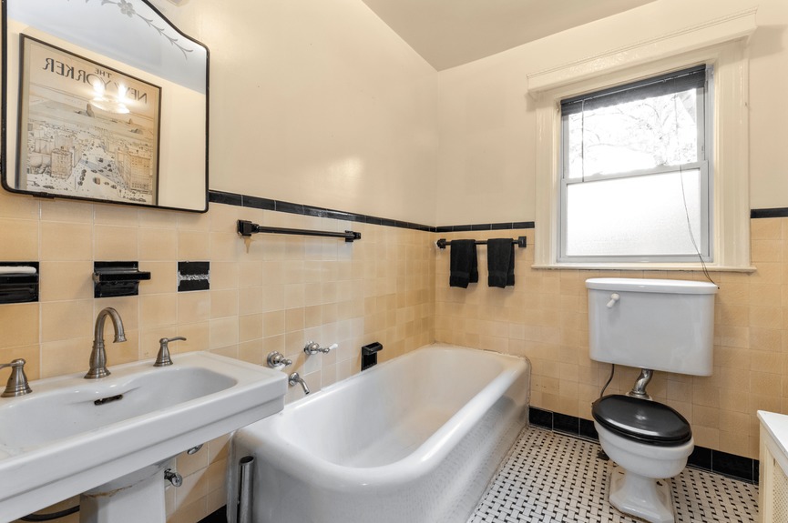 Bathroom at 34-32 84th St, a single-family house in Jackson Heights, Queens (11372).