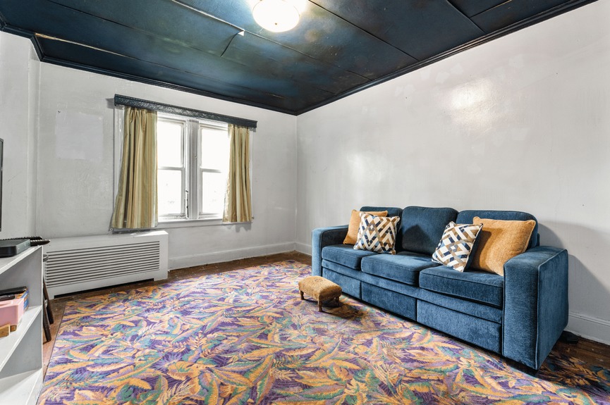 Bedroom at 34-32 84th St, a single-family house in Jackson Heights, Queens (11372).