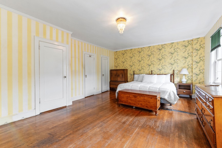 Bedroom at 34-32 84th St, a single-family house in Jackson Heights, Queens (11372).