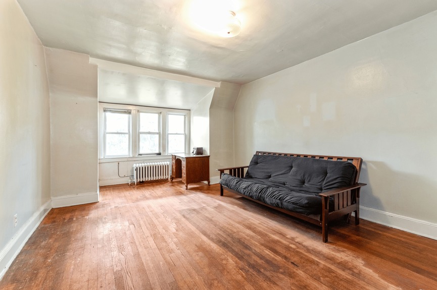 Bedroom at 34-32 84th St, a single-family house in Jackson Heights, Queens (11372).