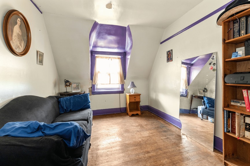 Bedroom at 34-32 84th St, a single-family house in Jackson Heights, Queens (11372).