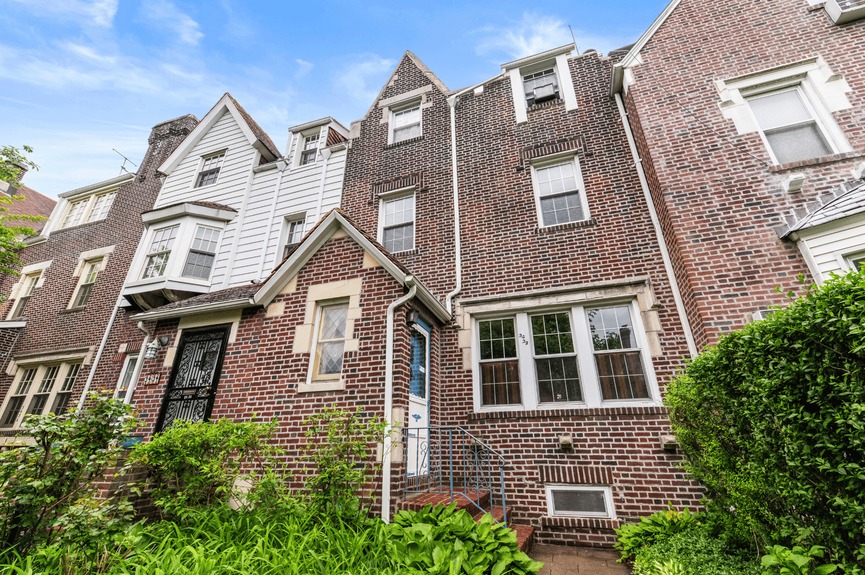 Building Exterior at 34-32 84th St, a single-family house in Jackson Heights, Queens (11372).