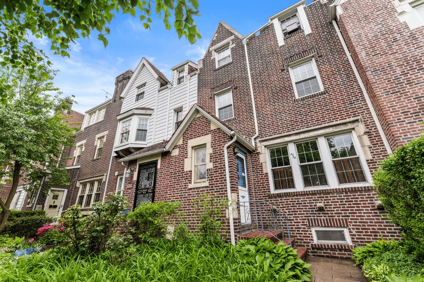 Building Exterior at 34-32 84th St, a single-family house in Jackson Heights, Queens (11372).