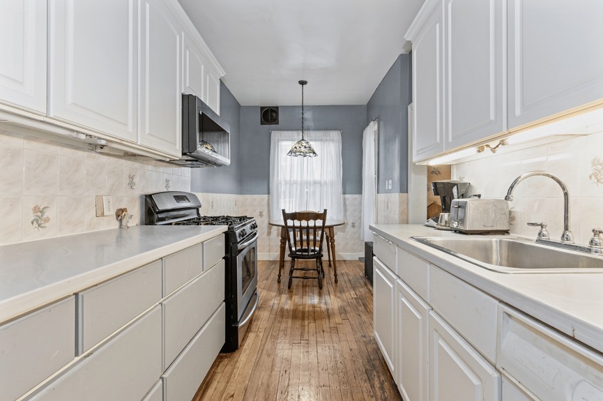 Kitchen at 34-32 84th St, a single-family house in Jackson Heights, Queens (11372).