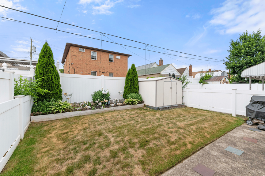 Backyard at 130-32 144th St, a single-family house in Jamaica, Queens (11436).
