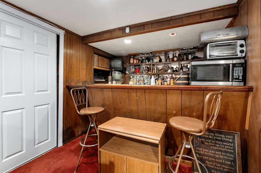 Bar at 130-32 144th St, a single-family house in Jamaica, Queens (11436).