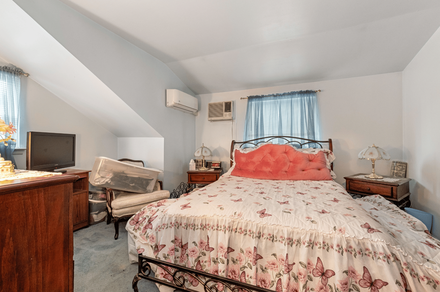 Bedroom at 130-32 144th St, a single-family house in Jamaica, Queens (11436).