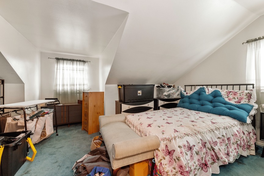 Bedroom at 130-32 144th St, a single-family house in Jamaica, Queens (11436).
