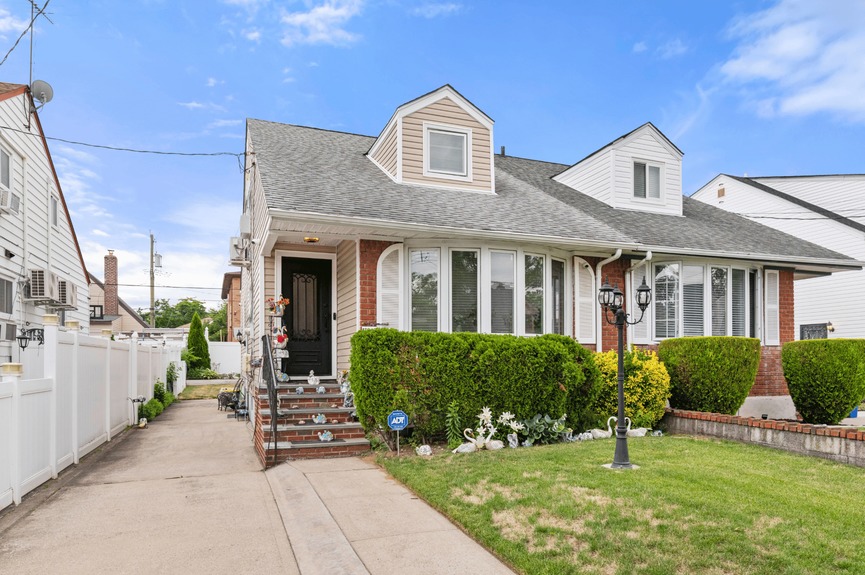 Exterior at 130-32 144th St, a single-family house in Jamaica, Queens (11436).
