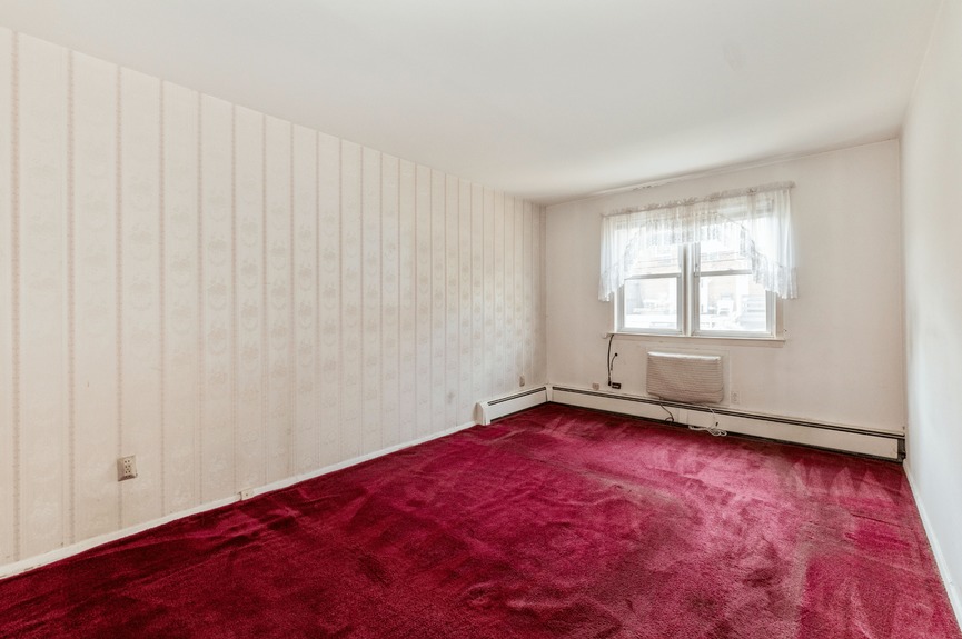 Bedroom at 144-24 25th Drive, a multi-family home in Flushing, Queens (11354)