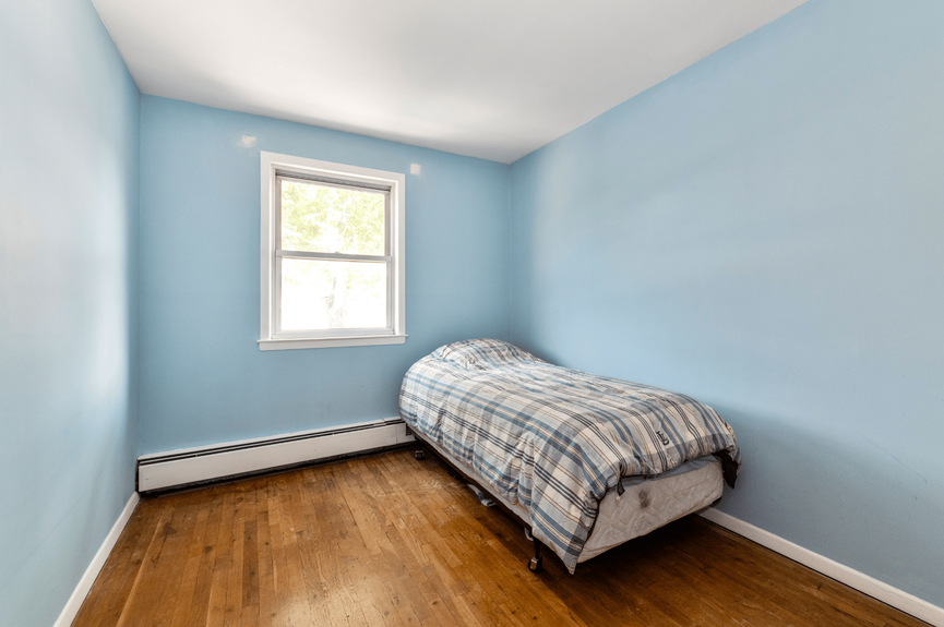 Bedroom at 144-24 25th Drive, a multi-family home in Flushing, Queens (11354)