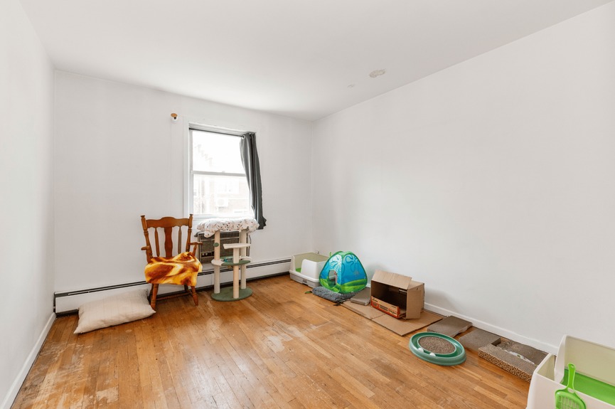 Bedroom at 144-24 25th Drive, a multi-family home in Flushing, Queens (11354)