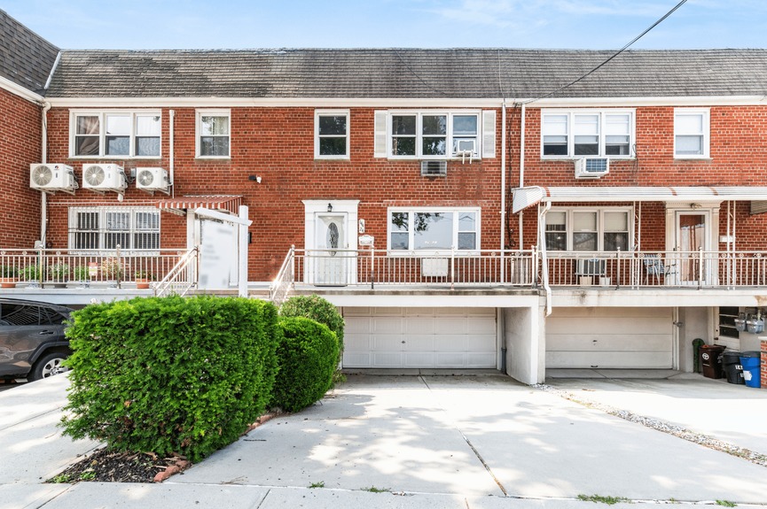 Home Exterior at 144-24 25th Drive, a multi-family home in Flushing, Queens (11354)