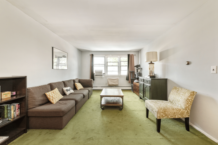 Living room at 144-24 25th Drive, a multi-family home in Flushing, Queens (11354)