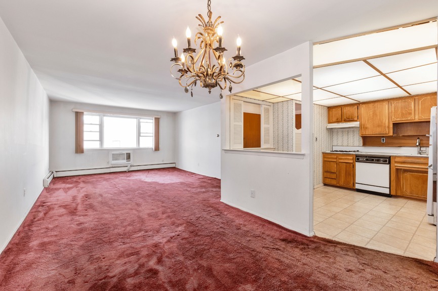 Living room and Kitchen at 144-24 25th Drive, a multi-family home in Flushing, Queens (11354)