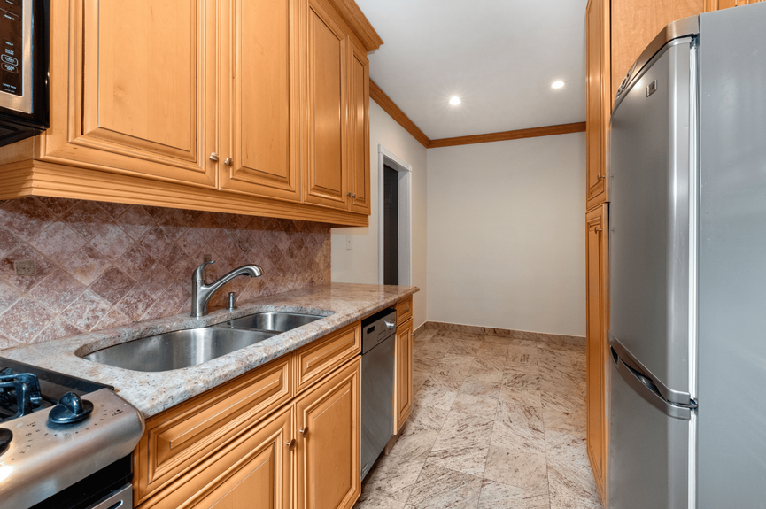 Kitchen and Dining Area at 25-40 31st Ave, Unit 6E, a co-op apartment in Astoria, Queens (11106)