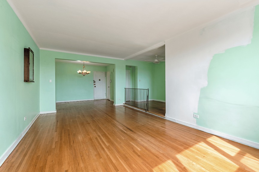 Living room, Dining Area, and Foyer at 34-41 85th St, Unit 6L, a co-op apartment in Jackson Heights, Queens (11372).