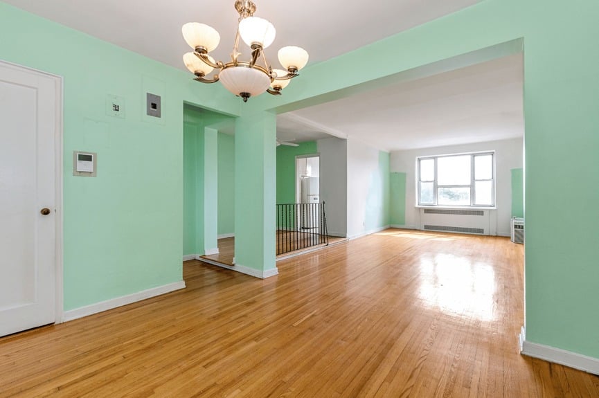 Living room, Dining Area, and Foyer at 34-41 85th St, Unit 6L, a co-op apartment in Jackson Heights, Queens (11372).