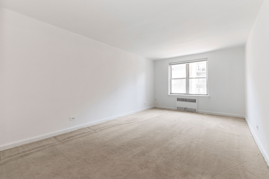 Living room at 39-65 51st St, Unit 4B, a co-op apartment in Woodside, Queens (11377)