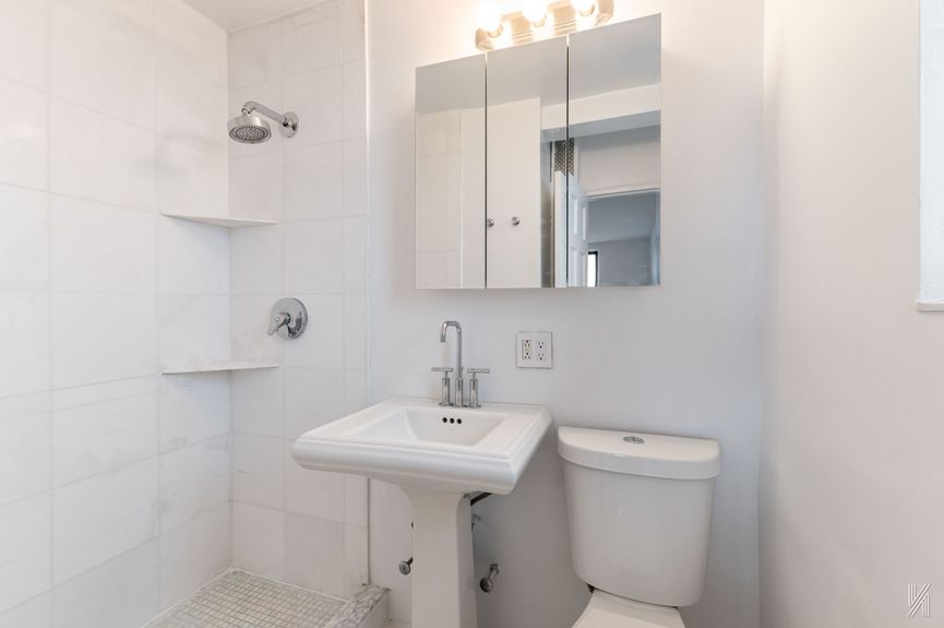 Bathroom at 41-42 73rd St, Unit 5B, a co-op apartment in Woodside, Queens (11377).