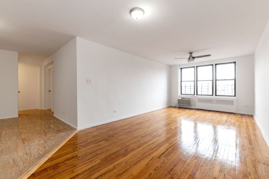 Living room at 41-42 73rd St, Unit 5B, a co-op apartment in Woodside, Queens (11377).