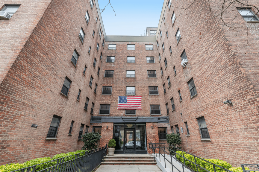 Building Exterior at 34-10 94th St, Unit 6G, a co-op apartment in Jackson Heights, Queens (11372).