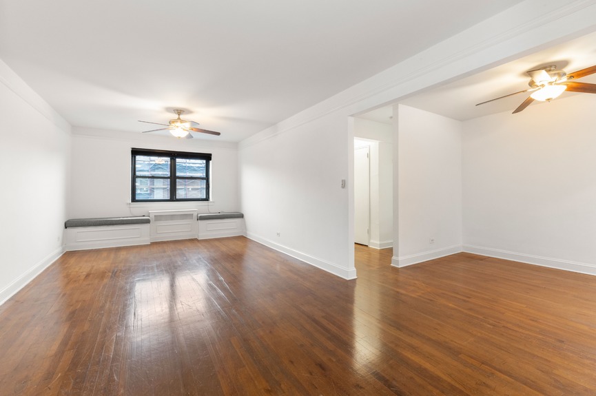 Living room and Dining Area at 34-10 94th St, Unit 6G, a co-op apartment in Jackson Heights, Queens (11372)