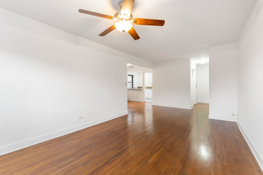 Living room and Foyer at 34-10 94th St, Unit 6G, a co-op apartment in Jackson Heights, Queens (11372)