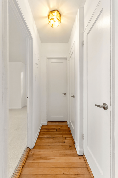 Hall at 39-25 51st St, Unit 1F, a co-op apartment in Woodside, Queens (11377)