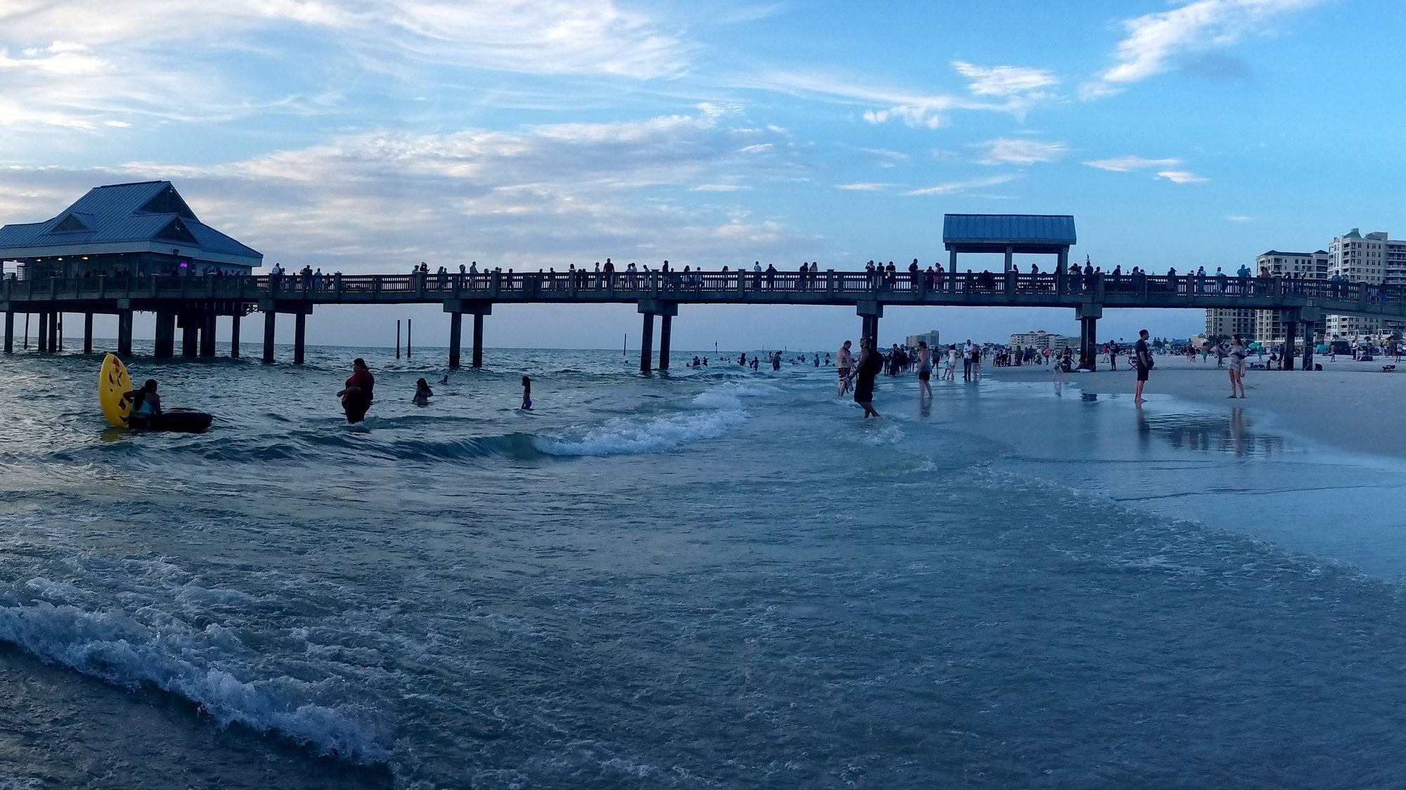 Pier 60 stretching into the Gulf of Mexico from the sand at Clearwater Beach, Florida