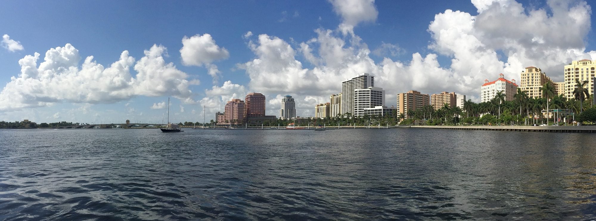 Downtown West Palm Beach skyline across the Intracoastal Waterway on a sunny day