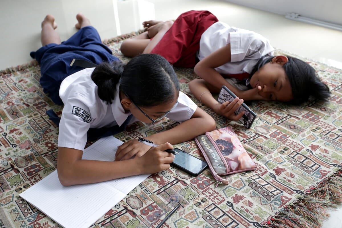 Children laying on a floor