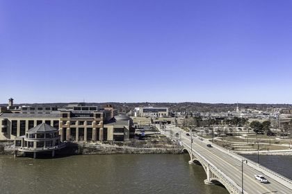 Elevated view looking north over the Grand River toward the Gerald R. Ford Presidential Museum and Pearl Street Bridge.