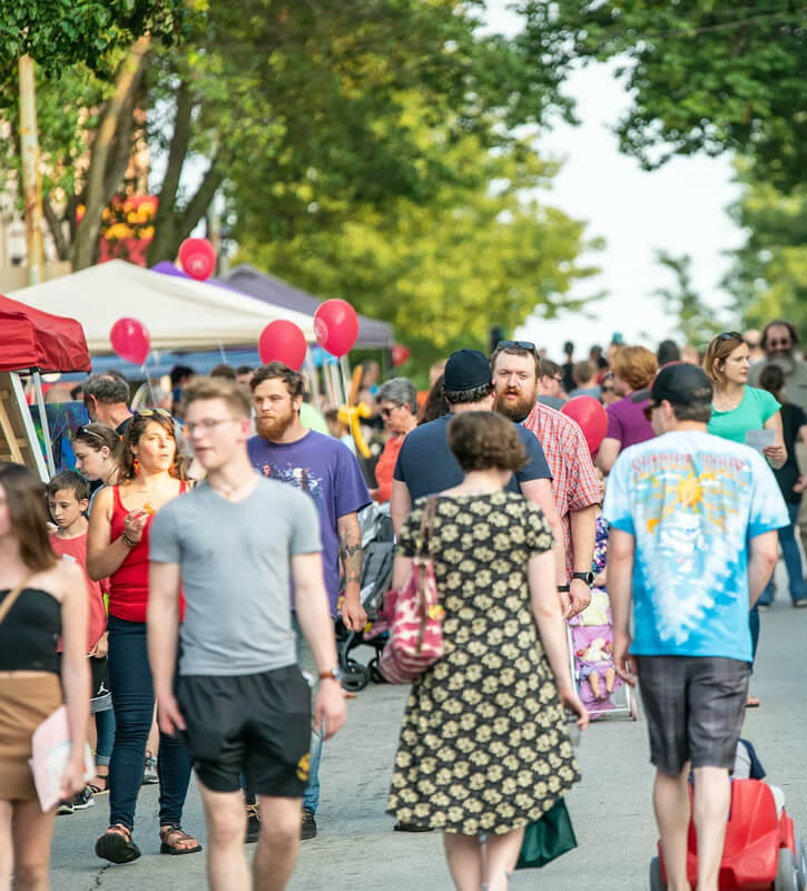 Phoenixville-residents-and-visitors-safely-walk-down-a-road-closed-to-traffic-during-last-years-street-closure