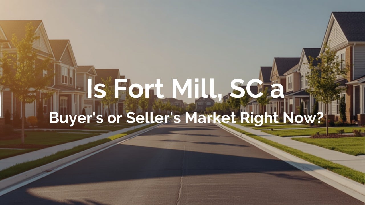 Fort Mill, South Carolina residential street with newer suburban homes and manicured lawns, representing the town's active, transitioning housing market.