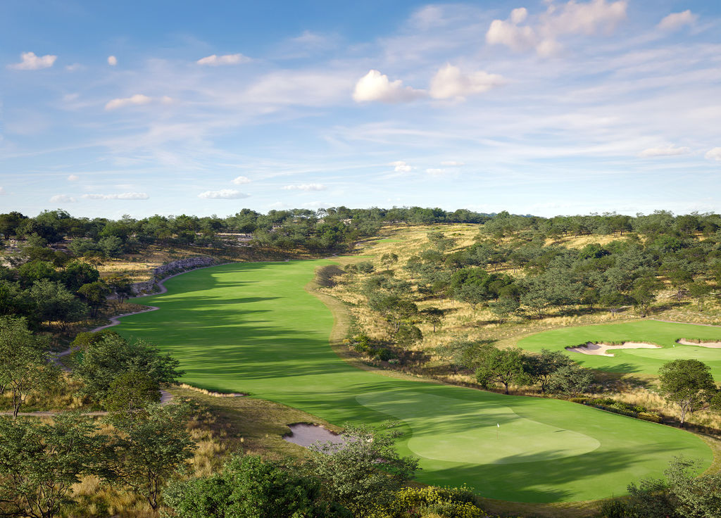 The Travis Club championship golf course overlooking Lake Travis, featuring pristine fairways, Hill Country views, and luxury lakeside surroundings.