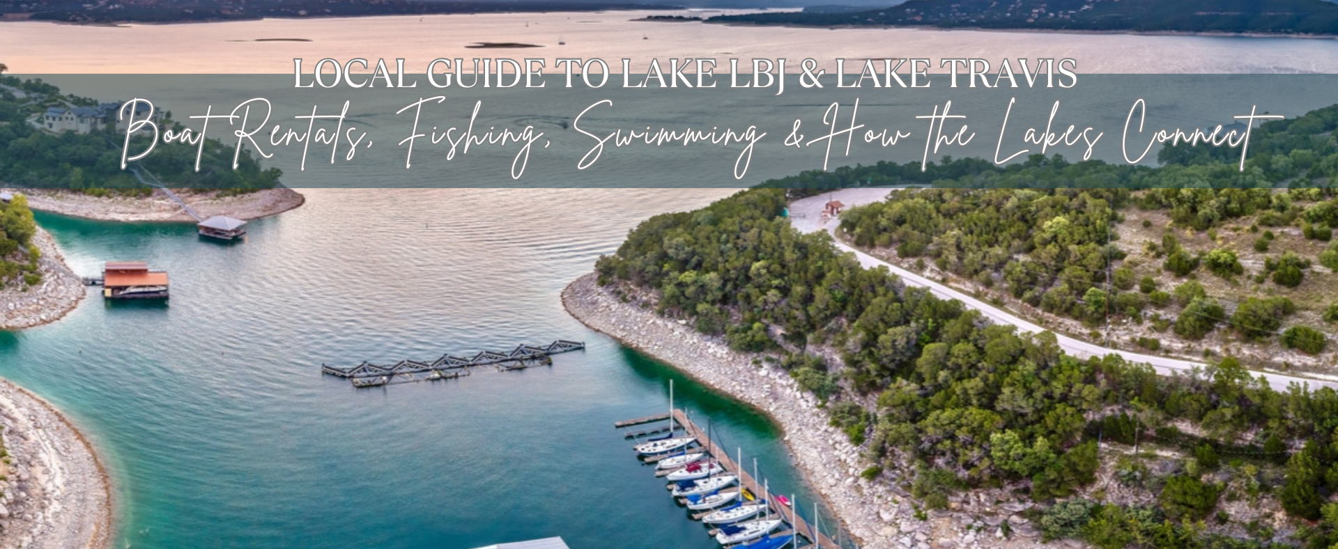 Aerial drone view of Lake Travis and Lake LBJ in Central Texas showing marina docks, boats, and waterfront shoreline surrounded by Texas Hill Country landscape.
