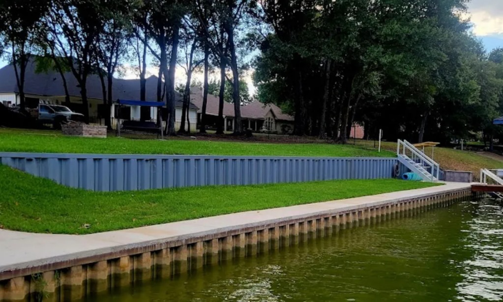 Lakefront home with updated bulkhead and protected shoreline on Lake LBJ or Lake Travis, adding long-term value and stability.